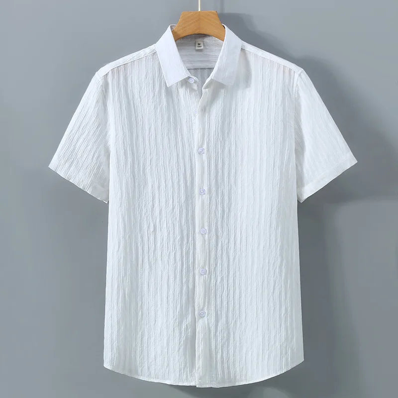En verano, ropa de protección solar para hombres, camisa de color sólido, mangas cortas transpirables de algodón suelto informal y versátil