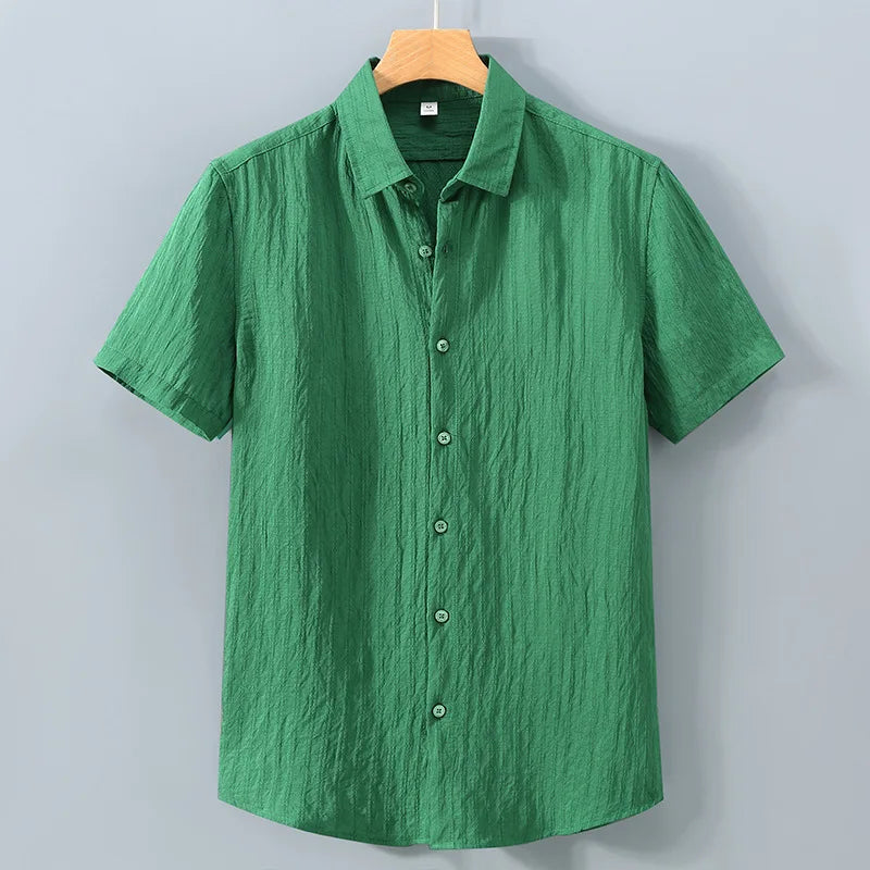 En verano, ropa de protección solar para hombres, camisa de color sólido, mangas cortas transpirables de algodón suelto informal y versátil