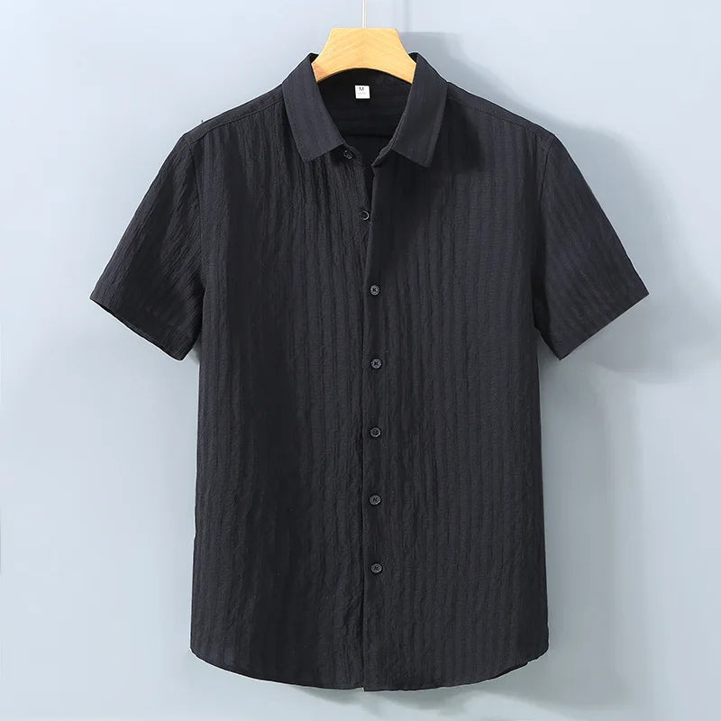 En verano, ropa de protección solar para hombres, camisa de color sólido, mangas cortas transpirables de algodón suelto informal y versátil